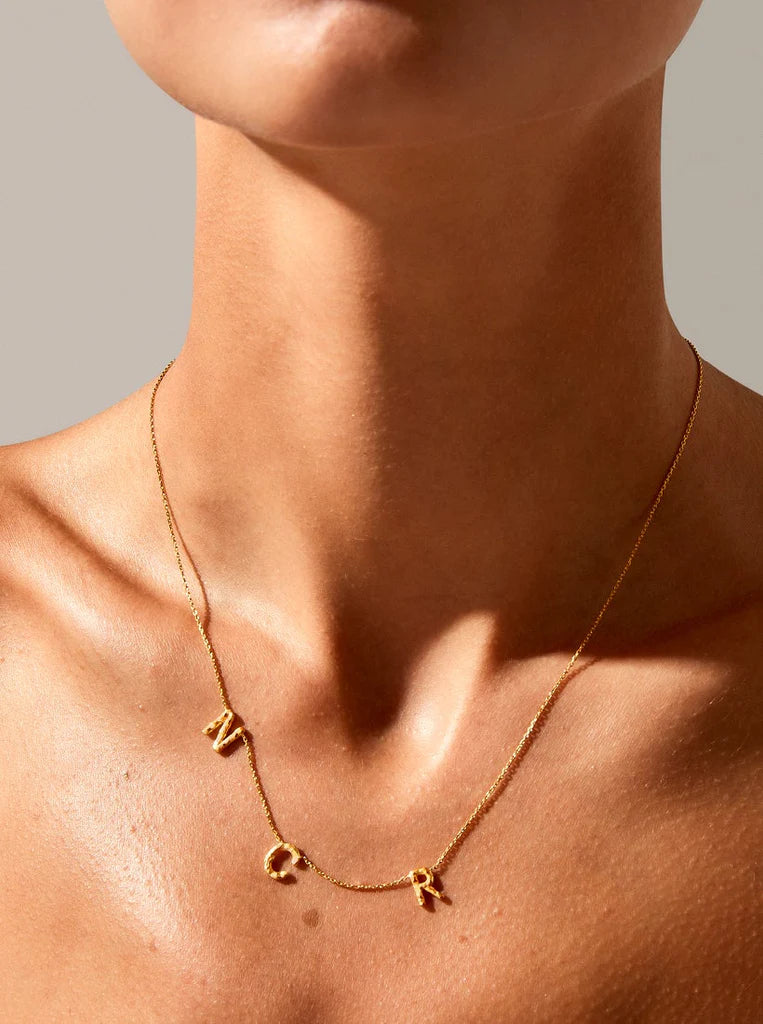 Sideways Triple Letter Gold Necklace